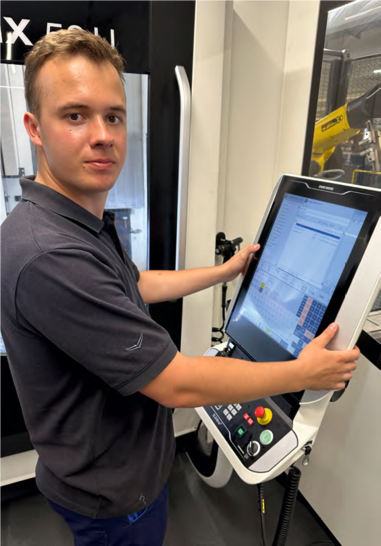 Christian Wulf ist Auszubildender zum Werkzeugmechaniker im dritten Lehrjahr. Er sagt, die Teilnahme an ROCKID.one habe ihm bei seiner persönlichen Entwicklung geholfen.